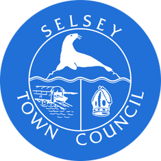 Selsey Town Council logo with a white seal, lifeboat station and crown