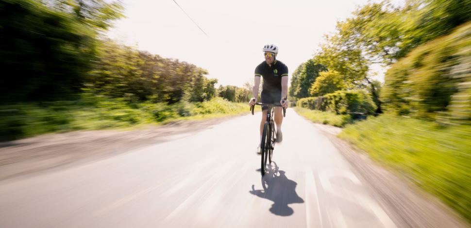 bens cycling along a country lane