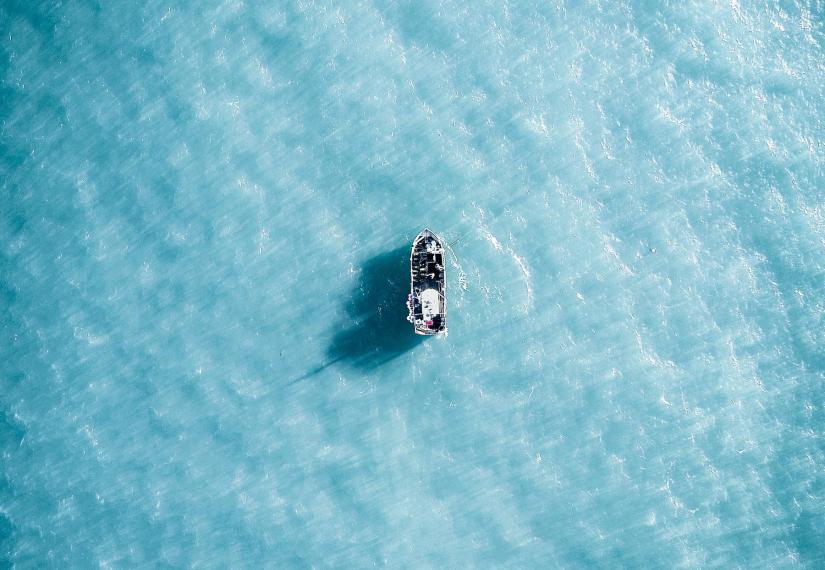 Fishing boat at sea aerial photograph