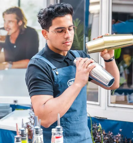 De'longhi staff mixing some cold brew coffee