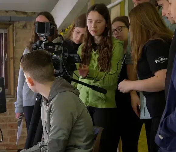 Students filming and using equipment