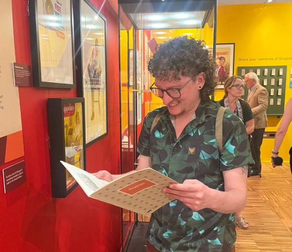Fern looking at literature at shippams exhibition