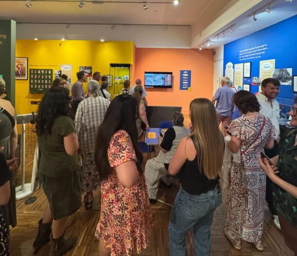 crowd watching our documentary at shippams exhibition