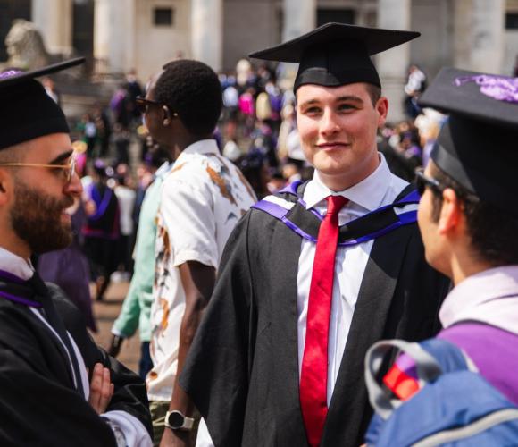 Students stood outside Portsmouth Guildhall for their graduation