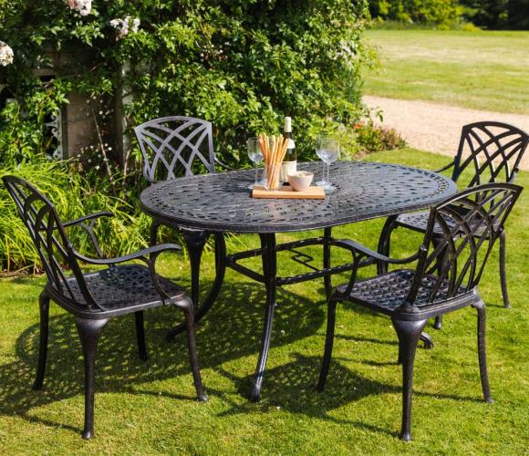 Lazy Susan garden furniture set on a grass lawn