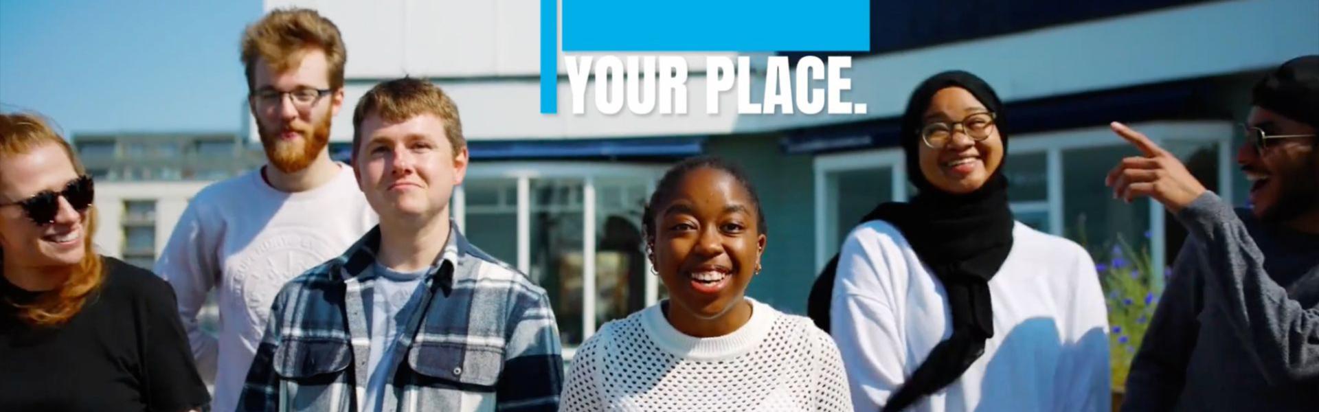 University of Portsmouth students walking toward camera