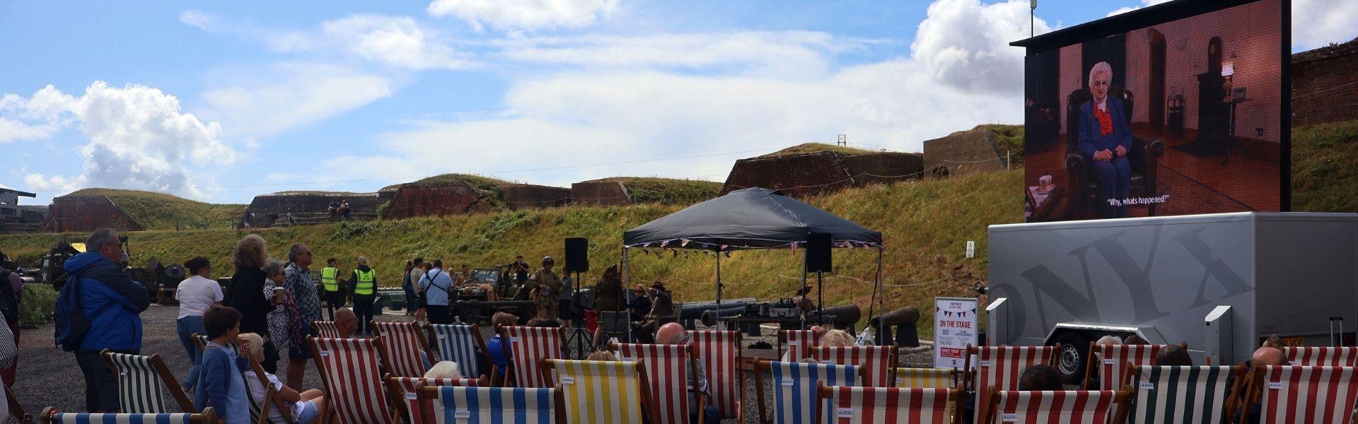 Screening of a VE day film outdoors at Fort Nelson Hampshire